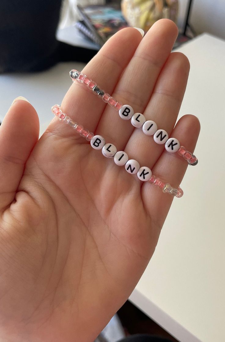 Handmade beaded elastic bracelets  Black Pink fanbase Blink bracelets in pink and white, pink and black  Approx 7cm in diameter and comfortably fits a 16cm wrist  *discounted item - letter beads have black ink marks  *Shipping within Australia default non tracked to reduce cost, please select upgraded for tracked* Trendy Pink Beaded Bracelets With Letter Print, Pink Beaded Kpop Bracelets, Pink Kpop Beaded Bracelets, Kpop Pink Beaded Bracelets, Trendy Pink Bracelets With Letter Print, Casual Pink Bracelet With Letter Print, Trendy Pink Letter Print Bracelets, Black Pink Members, Bracelets Black