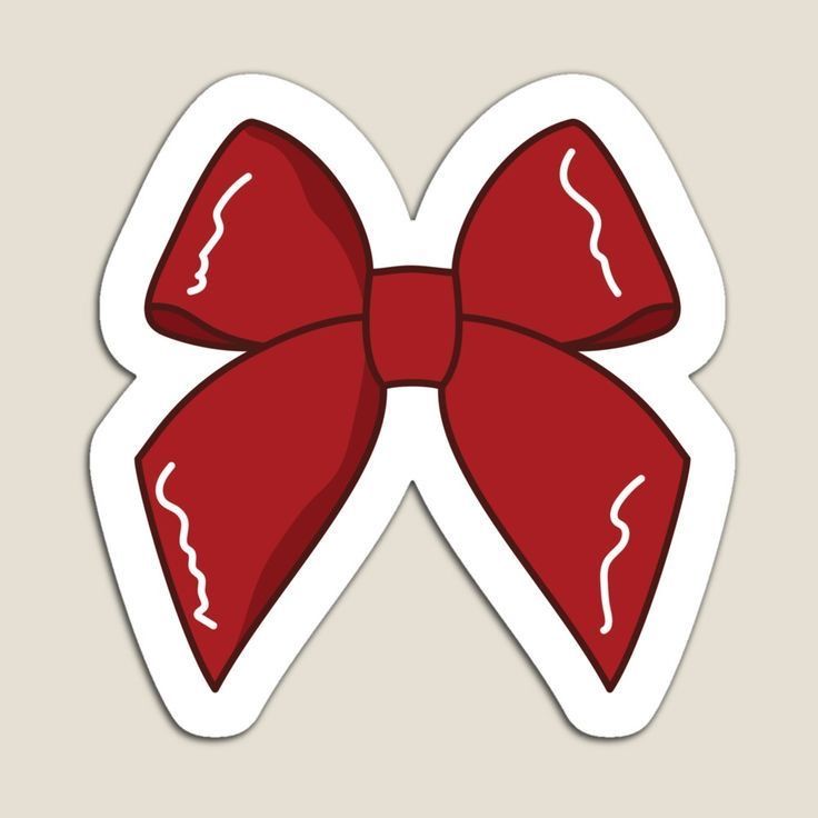 a sticker with a red bow on it