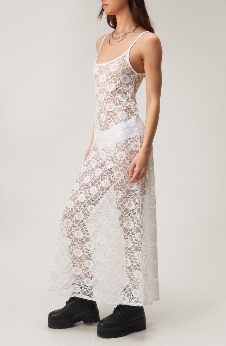 Sultry sheer lace brings skin-showing intrigue to a scoop-neck slipdress that's perfect for warmer weather. Exclusive retailer Scoop neck Sheer 100% polyester Machine wash, line dry Made in the UK Sleeveless Lace Beach Dress, White Sheer Slip Dress For Party, Summer Sleeveless Slip Dress With Sheer Back, Fitted Lace Slip Dress With Lace Back, Fitted Lace Back Slip Dress, Sheer Lace Dress With Spaghetti Straps For Spring, Lace Dresses With Sheer Back And Spaghetti Straps, Summer Sheer Lace Slip Dress, Fitted Slip Dress With Delicate Lace