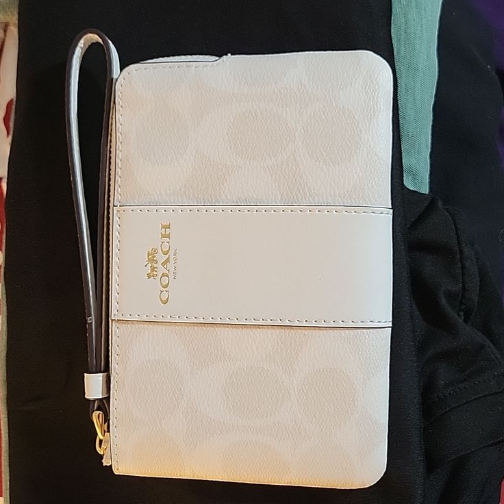 Coach White And Gold Wristlet Nwot Holds Two Cards Also! Elegant White Clutch With Zipper Closure, White Coach Clutch With Zipper Pouch, White Rectangular Coach Clutch, White Clutch With Zipper Closure For Travel, White Zipper Pouch Wallet, White Clutch Wristlet With Wrist Strap, White Wristlet Clutch With Wrist Strap, Coach White Wallet With Zipper Pouch, Coach White Rectangular Wristlet