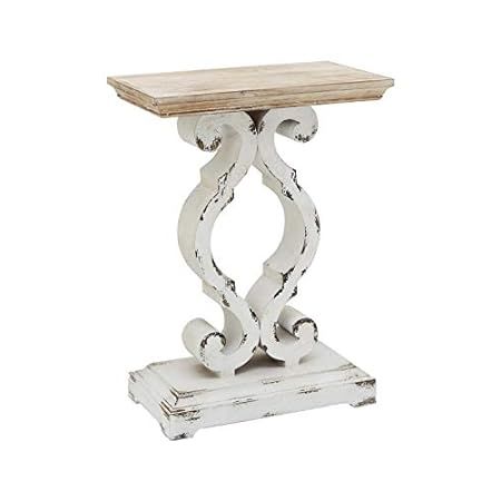 a white wooden table with an ornate design on the top and bottom, against a white background