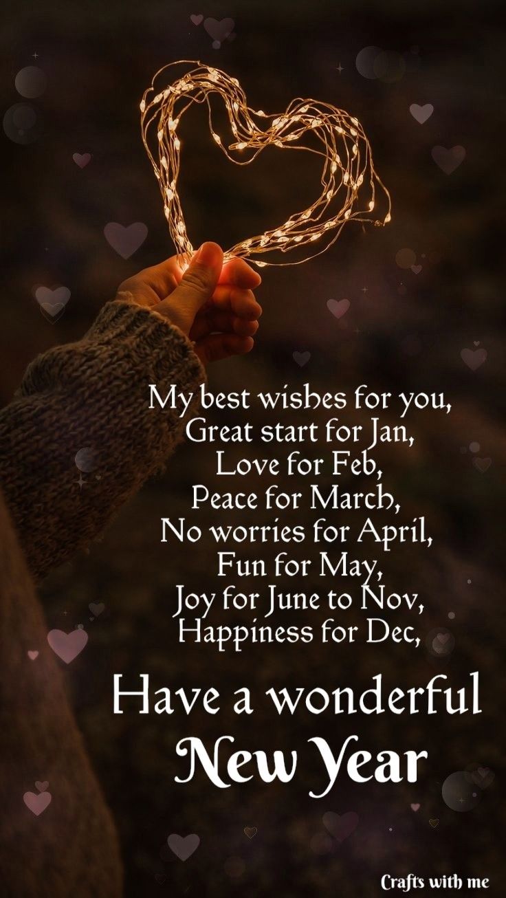 someone holding a heart shaped string with the words have a wonderful new year on it