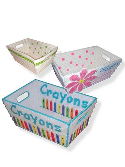 three boxes with crayons on them are shown in three different colors and designs