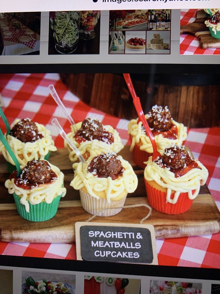 cupcakes with spaghetti and meatballs in them are on a wooden platter