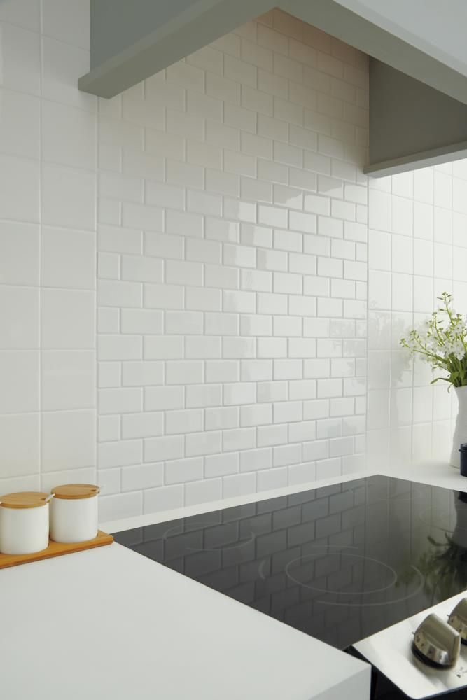 Polish your space with the American Olean 12-in x 12-in Starting Line white gloss brick mosaic ceramic wall tile. The durable high gloss finish makes this mosaic pop as a kitchen backsplash. Use it in your bathroom for a sleek, pristine look. American Olean Starting Line White Gloss 12-in x 12-in Glazed Ceramic Mosaic Wall Tile (0.83-sq. ft/ Piece) | SL1024BJHC1P2 White Subway Tiles Kitchen Backsplash, Brick Wall Tile, Brick Wall Tiles, Brick Mosaic, Subway Tile Backsplash Kitchen, Brick Material, White Kitchen Tiles, Mosaic Ceramic, White Subway Tile Backsplash