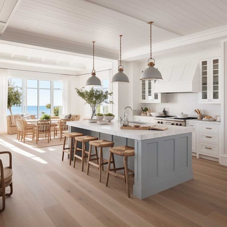 a large kitchen with an island in the middle and lots of counter space next to it