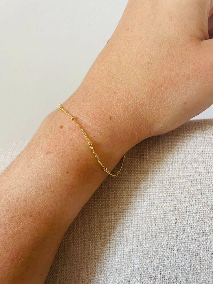 High quality 14k gold fill materials only, designed to resist the wear and tear of daily life and regular wear!  - 14K Gold Fill Satellite Chain - 14K Gold Fill Lobster Clasp Closure Dainty 14k Gold Filled Tarnish Resistant Bracelet, Dainty Tarnish Resistant 14k Gold Filled Bracelet, 14k Gold Filled Satellite Chain Bracelet As Gift, Delicate Gold Bracelet With Chain As Gift, Simple 14k Gold Bracelets As Gift, Minimalist Yellow Gold Hypoallergenic Bracelets, Minimalist Hypoallergenic Yellow Gold Bracelets, 14k Gold Filled Satellite Chain Bracelet, 14k Gold Filled Delicate Chain Bracelet As Gift