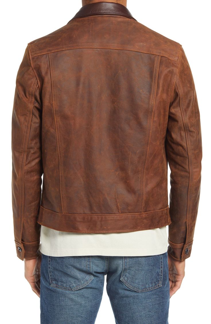 A contrast goatskin collar tops a classic, American-made jacket crafted from hearty cowhide leather that's been slightly burnished for a handsome look. 25" length Front button closure Spread collar Chest zip pocket; front welt pockets Lined Leather Made in the USA of imported fabric Men's Clothing Rugged Brown Leather Jacket With Leather Lining, Rugged Brown Leather Jacket With Padded Collar, Brown Leather Outerwear With Padded Collar, Rugged Distressed Brown Leather Outerwear, Rugged Leather Biker Jacket, Classic Distressed Brown Leather Outerwear, Classic Vintage Brown Leather Biker Jacket, Classic Brown Leather Jacket With Padded Collar, Rugged Distressed Brown Leather Biker Jacket