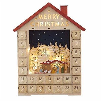 a wooden calendar with a christmas scene on it