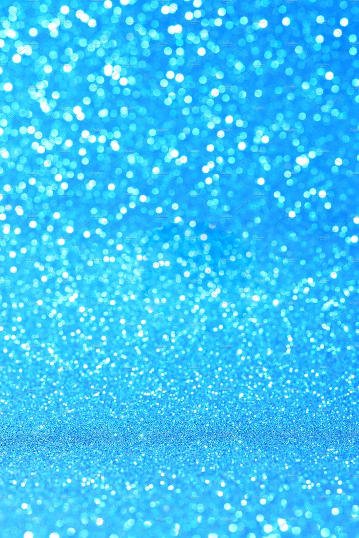 a blue glitter background with small white dots