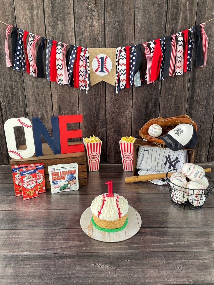 a baseball themed birthday party with cupcakes and decorations