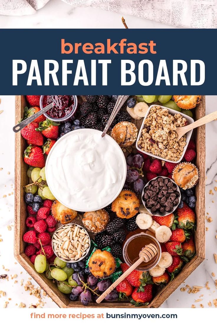 the breakfast parfait board is full of fresh fruit, nuts and yogurt