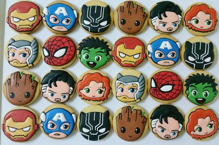 decorated cookies with avengers characters on them