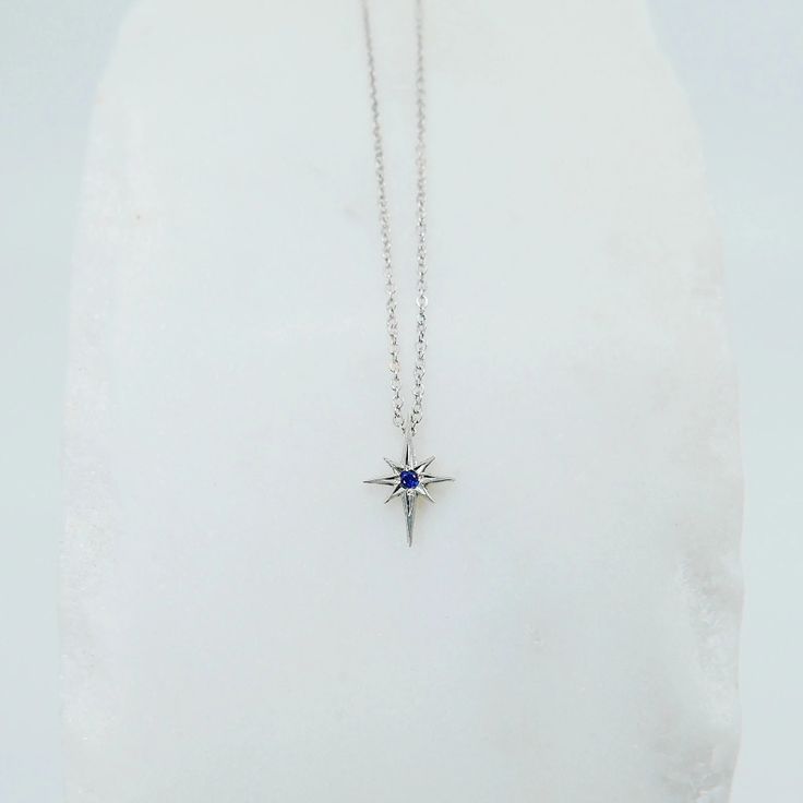 Polaris Sapphire Necklace | Mason Grace Star Shaped Sapphire Jewelry Gift, Sterling Silver Star Necklace With Gemstone, Sterling Silver Star Necklace In Fine Jewelry Style, Sterling Silver Star-shaped Necklace With Birthstone, Blue Star-shaped Gemstone Necklace, Blue Sterling Silver Necklace With Star Charm, Sterling Silver Star Birthstone Necklace, Sterling Silver Sapphire Star Jewelry, Celestial Star Sapphire Jewelry