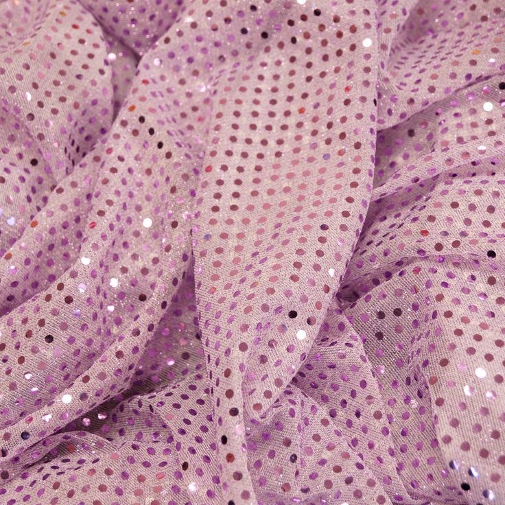 This polyester sequin fabric is sure to add pizzazz to any costume, from dance recital dresses to fun purses to Halloween costumes! The lovely metallic sheen is offset beautifully by the see-through polyester backing. Perfect for layering, it's very light weight but surprisingly resistant to tearing. A lovely, liquid draping quality adds to the enchantment! It's the perfect material for Disco Night, cheer bows, Halloween and dance costumes. Spring Disco Sequin Fabric With Glitter, Spring Disco Glitter Sequin Fabric, Pink Glitter Sequin Fabric For Spring, Purple Sequin Fabric For Spring Party, Metallic Glitter Sequin Fabric For Spring, Spring Metallic Glitter Sequin Fabric, Pink Glitter Sequin Fabric For Summer, Summer Pink Sequin Fabric With Glitter, Purple Sequin Fabric For Summer Party