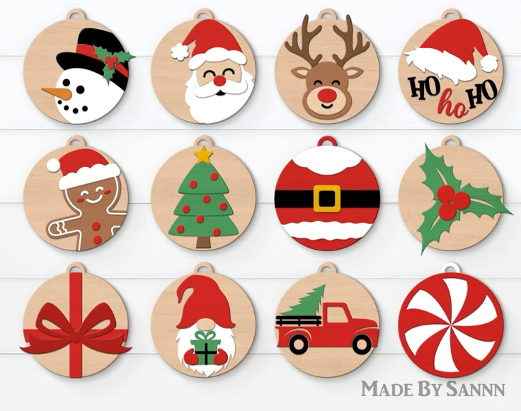 twelve christmas ornaments with santa claus, snowman, reindeer and other holiday related items