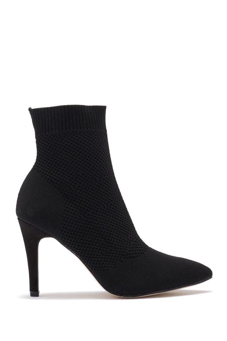 A knit upper provides a sophisticated, sleek look into a slim heeled bootie for a versatile attire. Sizing: True to size. M=standard width. Pointed toe. Allover knit construction. Pull-on. Sock-like detail at ankle. Stiletto heel. Approx. 6" shaft height, 8" opening circumference. Approx. 4" heel. Imported Winter Heeled Boots With 4-inch Heel And Medium Width, Modern Heeled Boots For Winter Night Out, Elegant Black Stretch Boots, Fitted Fall Booties With 4-inch Heel, Winter Heeled Boots With 4-inch Heel, Fitted High Ankle Booties For Work, Chic Stretch Boots With Pointed Toe, Snug Fit Ankle-high Workwear Booties, Fitted High Heel Winter Booties