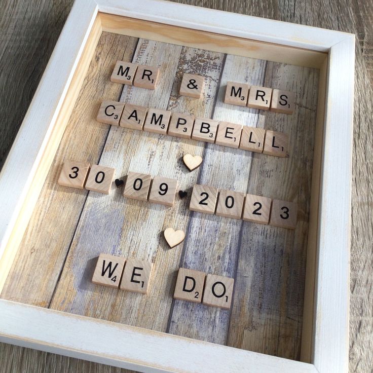 scrabble tiles spelling out the names of mr and mrs campbell's campibil