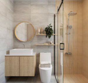 a bathroom with a toilet, sink and shower stall in it's center area