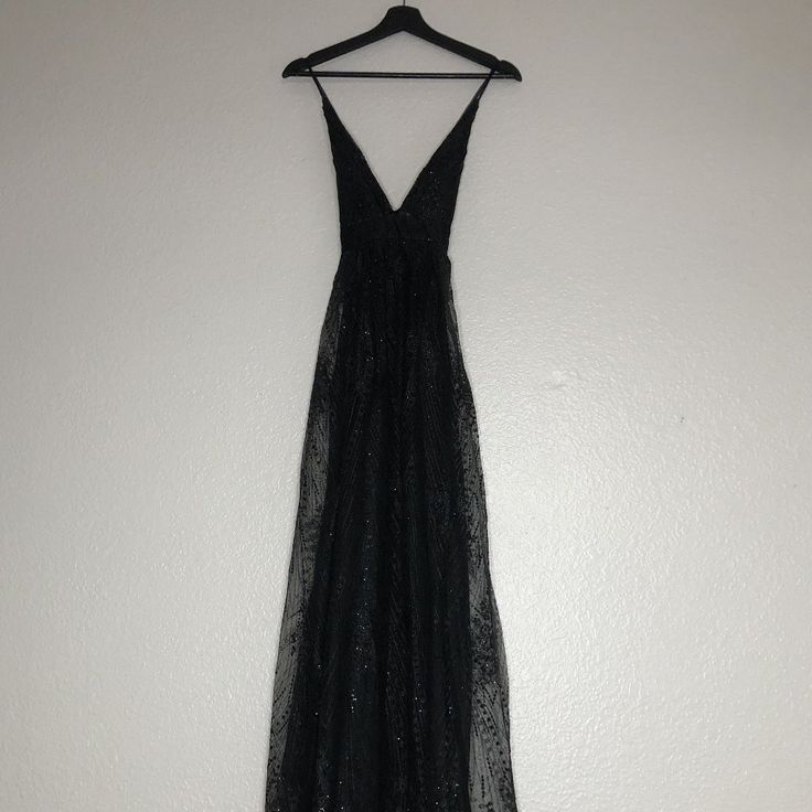 This Is A Long Polyester Cocktail Dress From Windsor In Women's Size Small. It Has A Black Glittered Design With A V-Neck & Spaghetti Straps That Crisscross In The Back. Chest: 12" Across From Pit To Pit. Length: 59". Brand New. Tags Are Still Attached. Windsor Dresses Black, Windsor Glitter Dress, Windsor Black Sparkly Dress, Fitted Gothic V-neck Dress, Black Sequence Dress, Luxury Black V-neck Sequin Dress, Lace Front Dress, Strapless Sequin Dress, Padded Dress