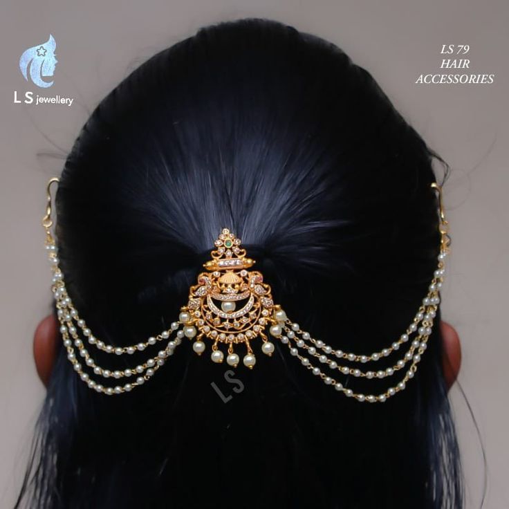 a close up of a woman's head wearing a gold and pearl tiara