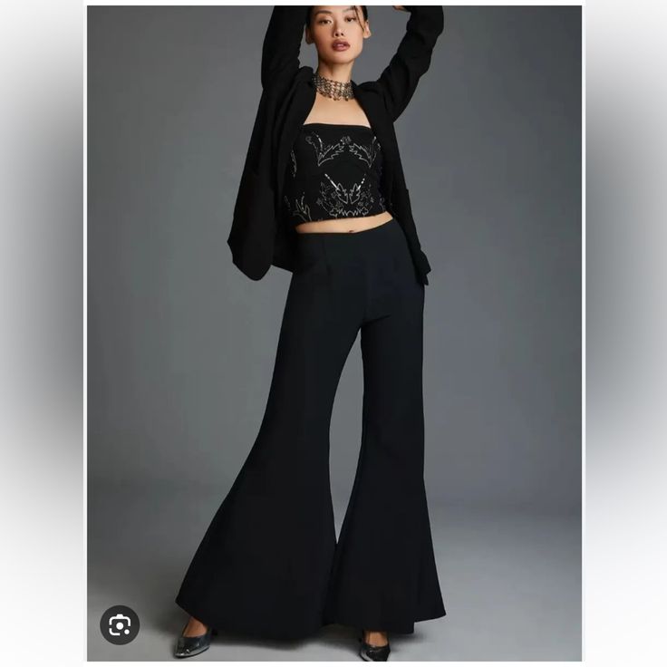 Flare Pants. Black Bell Bottom Pants. Machine Wash. Bottom Leg Opening 21.5"Across (43" Around). Zip Closure Fall High-waisted Dress Pants For Night Out, Fitted Wide Leg Pants For Fall Party, Fall Wide Leg Pants For Night Out, Wide Leg Pants For Fall Night Out, Fitted Wide-leg Pantsuit, Evening Pantsuit With Trousers For Fall, Fall Evening High-waisted Pantsuit, Full-length Evening Pants For Fall, Full Length Dress Pants For Night Out In Fall