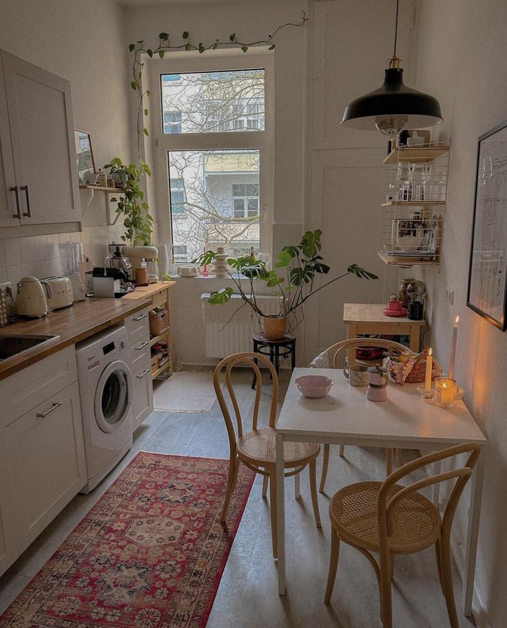 the kitchen is clean and ready to be used for cooking or dining, with no one in it