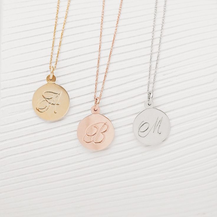 Luna Script Necklace in gold, rose gold, or silver. #scriptnecklace #tagnecklace #jewelry Rose Gold Pendant Charm Necklace In Fine Jewelry Style, Rose Gold Pendant Charm Necklace, Elegant Round Medallion Necklace Gift, White Gold Round Charm Necklace As Gift, Elegant Round Disc Medallion Necklace As Gift, Engraved Rose Gold Necklaces In Fine Jewelry Style, Engraved Rose Gold Necklaces Fine Jewelry, Round White Gold Charm Necklace As Gift, Round White Gold Charm Necklace Gift