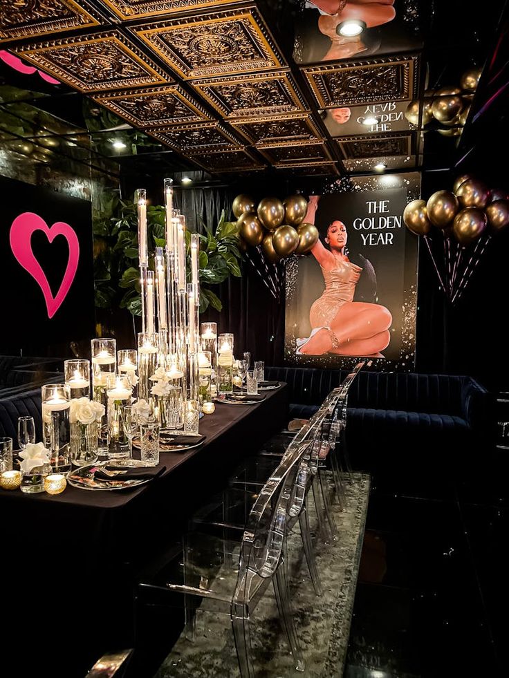 a long table is set up with candles and decorations for a new year's eve party