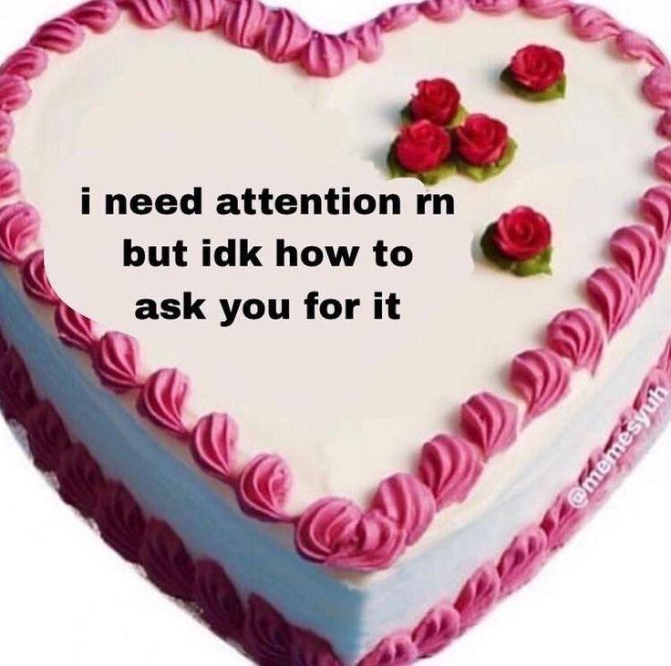 a heart shaped cake with pink frosting and roses on it that says i need attention m but i did how to ask you for it