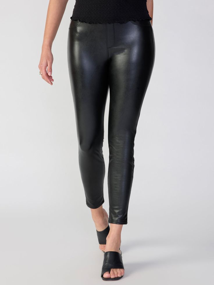 Details Not your average legging. The Runway Legging in Slick Black features a leather-like finish with plenty of stretch and functional back pockets. Semi High Rise Faux Leather Pull-On Legging Full-Length Form Fitting with Stretch Cool and Smooth Fabrication Faux Front Pockets Functioning Back Pockets Elastic Waist Size + Fit Model is 5'7 wearing a size XS. Garment is Measured on Size Small. Waist: 28 inches Front Rise: 10 1/2 inches Leg Opening: 9 1/2 inches Inseam: 27 1/2 inches Fabric + Car Sleek Black Leather Leggings, Sleek High-rise Black Leather Pants, Blundstone Men, Sleek Full-length Faux Leather Leggings, Faux Leather Tight Full-length Leggings, Fitted Full-length Leather Leggings, Denim Jogger Pants, Basic Shoes, Maxi Jumpsuit