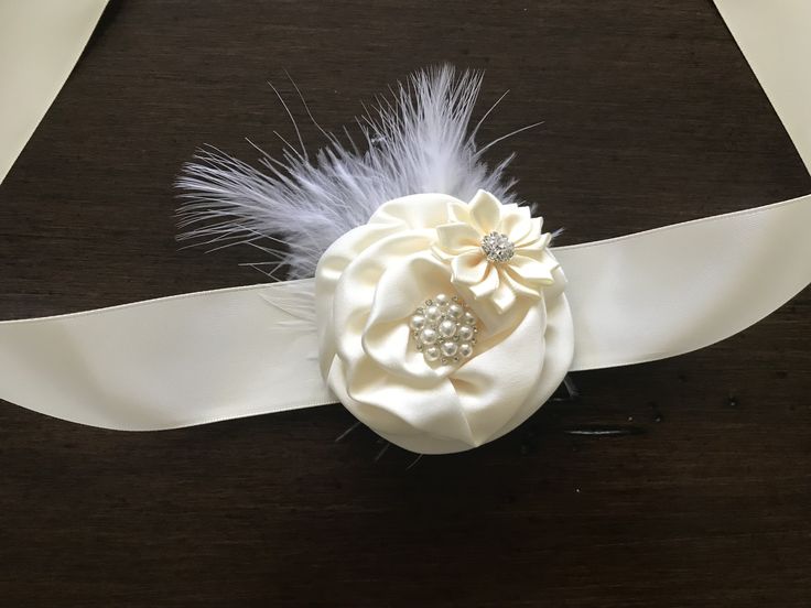 This beautiful Ivory baby headband, sash, and baby barefoot sandals set. Part of the Summer Breeze Collection, this headband, sash, and barefoot sandals set is perfect for baby baptism, baptism reception, baby christening, baby first photo, and baby birthday.Available Sizes:14" (0-6 Months)16" (6 Months - 4 Years)18" (4 Years - Adult)* Please note that the headband's stretchy material allows for it to fit longer than the age listed. * Items sold separately. Please select item(s) to be purchased. White Adjustable Wedding Sashes, Elegant White Headband For First Communion, Adjustable Cream Bridal Accessories As Gift, Adjustable White Headband For First Communion, Elegant Adjustable Headband For Baptism, Baby First Photo, Baptism Reception, Baptism Headband, Christening Shoes