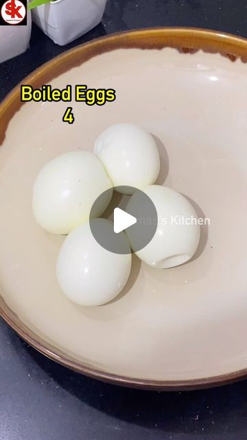 an image of boiled eggs in a bowl on a table with the words boiled eggs 4