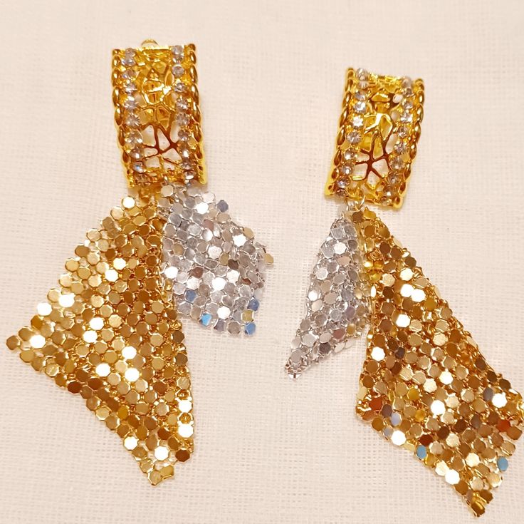 Very Cute Style Handmade Originals Pretty Dangle Rhinestone Gold Metal Mesh Gold And Silver Metal Style Hangs 3 Inches Clip On Closure Very Light On The Ear Lovely Design For Any Fancy Occasion Dazzling Gold Earrings For Festive Occasions, Gold Bridal Earrings With Bling For Parties, Metal Drop Earrings Danglers For Party, Silver Earrings With Stone Work, Gold Rhinestone Bridal Earrings, Metal Drop Danglers For Party, Gold Bridal Earrings With Rhinestones For Party, Gold Bridal Earrings With Stone Work For Party, Dazzling Gold Bridal Earrings For Party