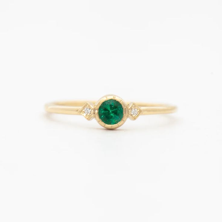 Emerald Sotto Voce Ring – No.3 Timeless Green Diamond Promise Ring, Classic Green Emerald Stackable Rings, Fine Jewelry Green Emerald Stackable Rings, Green Emerald Stackable Rings In Fine Jewelry Style, Dainty Green Solitaire Diamond Ring, Elegant Green Stackable Rings With Bezel Setting, Dainty Green Emerald Stackable Rings, Green Emerald Ring With Bezel Setting, Emerald Ring With Single Diamond For Anniversary