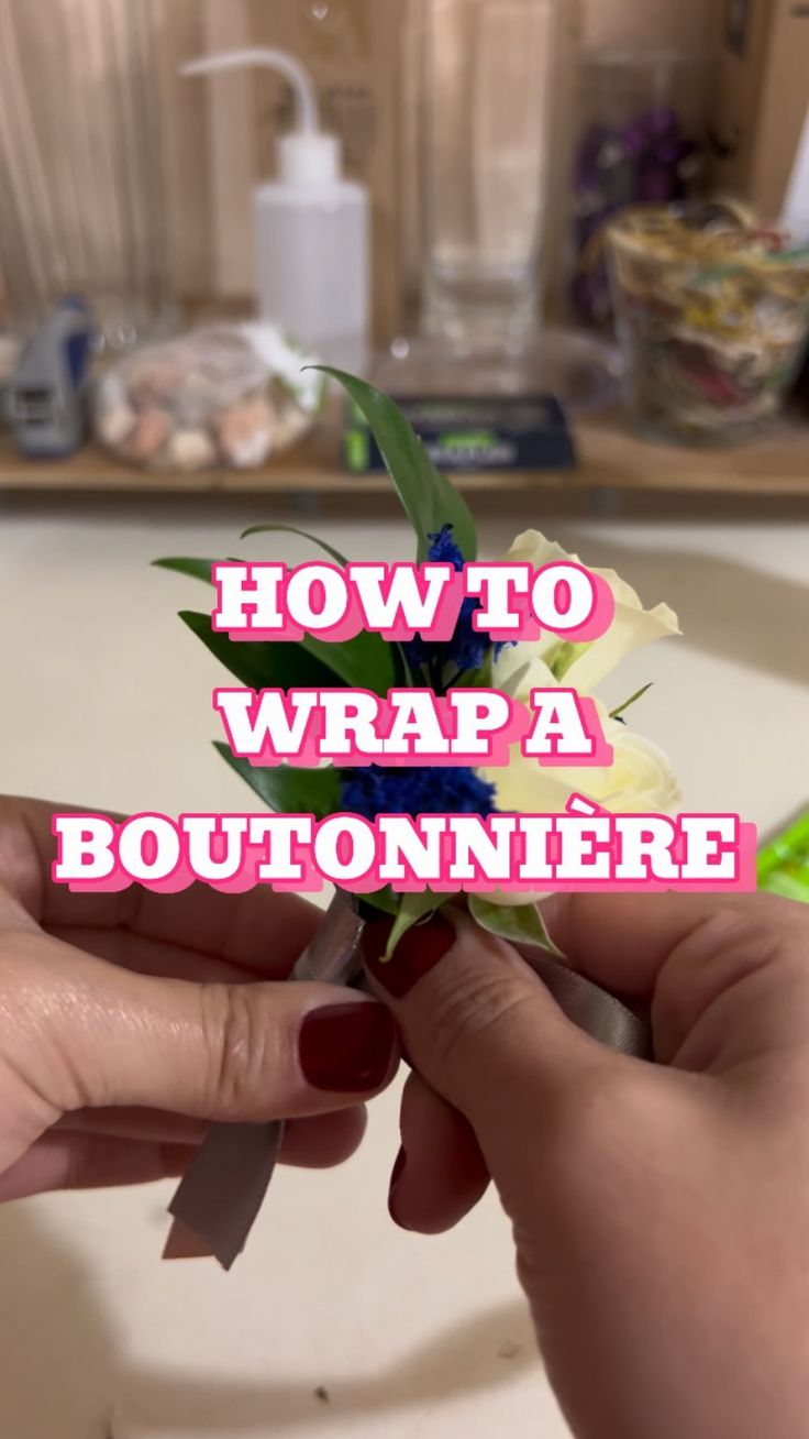 someone is holding a flower with the words how to wrap a boutonniere