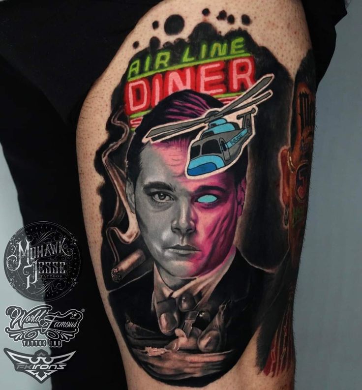 a man's leg with a tattoo on it that says air line diner and an airplane