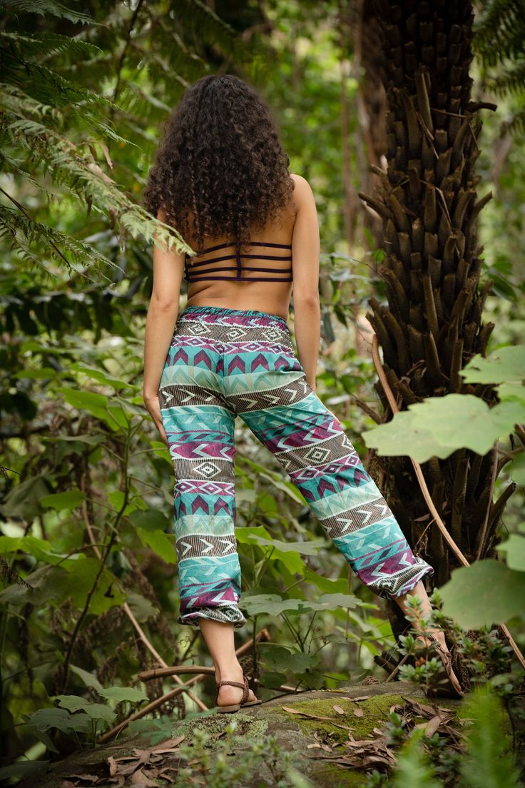 These tribal, bohemian-style pants are super soft and comfy! If your wish is freedom, your wish is these pants command! The Yoga Savasana Pants are light and breathable so they are ideal for yoga. They have elastic ends so they can be shortened for extra styling. In these pants, you can jump, twist, bounce, and be wild! CHECK THIS VIDEO OF A YOGA SESSION WITH THE PANTS : https://www.instagram.com/p/BPG46ZigA-P/ Material : 100% Cotton Hand made with Love ❀ Vacation Hippie Pants With Boho Print, Bohemian Stretch Bottoms For Vacation, Boho Print Hippie Pants For Vacation, Hippie Boho Print Pants For Vacation, Vacation Boho Print Hippie Pants, Bohemian Stretch Pants For Vacation, Casual Harem Yoga Pants For Festival, Bohemian Lounge Pants With Elastic Waistband, Bohemian Harem Pants With Boho Print For Vacation