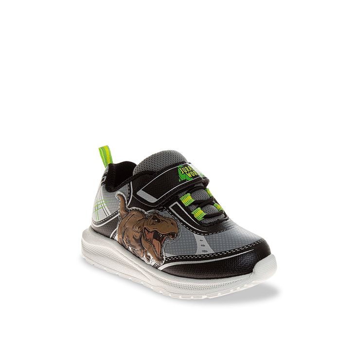 Jurassic World-Dinosaur Sneaker - Kids' Little dino fans can take on the day in the Jurassic World Dinosaur sneaker. Dino prints bring a touch of prehistoric style to this hook-and-loop sneaker, also designed with stretch lace front for added comfort. Not sure which size to order? Click here to check out our Kids Measuring Guide! For more helpful tips and sizing FAQs, click here . . Synthetic Sneakers With Character Print And Round Toe, Black Sneakers With Character Print, Puma Original, Vans Original, Jurassic World Dinosaurs, Bridal Wedding Shoes, Adidas Fashion, Trending Sneakers, Mens Essentials