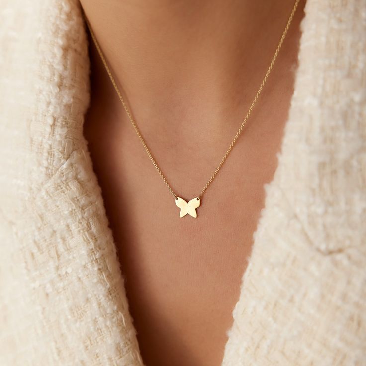 Butterflies have long been regarded as symbols of transformation throughout the world due to their journey from caterpillar to decorative, vibrant butterfly. Whether you've recently gone through your beautiful transformation or you've always just loved butterflies, this minimalist gold butterfly pendant necklace is a stylish addition to your wardrobe.  ▶  Features * Made to Order.  * Gold KT: 14K * Custom Gold Color: Rose Gold, Yellow Gold, White Gold * Charm - 10mm x 8mm * Ready to Ship in 3-5 Business Days ▶ See more of our Gold Bracelets here - http://etsy.me/2l9VKBr ▶ See our storefront here - http://etsy.me/2lUcVnH  ▶ All store sections here * Diamond Rings - http://etsy.me/2lwKUl8 * Diamond Earrings - http://etsy.me/2lyqVBP * Diamond Necklace - http://etsy.me/2mqa6O1 * Diamond Bracel Yellow Gold Butterfly Necklace With Butterfly Clasp, Yellow Gold Butterfly Charm Necklace, 14k Yellow Gold Necklace With Butterfly Charm, Yellow Gold Pendant Necklace With Butterfly Charm, 14k Yellow Gold Butterfly Pendant Necklace, Yellow Gold Butterfly Pendant Necklace With Clavicle Chain, Dainty Yellow Gold Butterfly Pendant Necklace, Delicate Yellow Gold Necklace With Butterfly Charm, Fine Jewelry Butterfly Charm Necklace