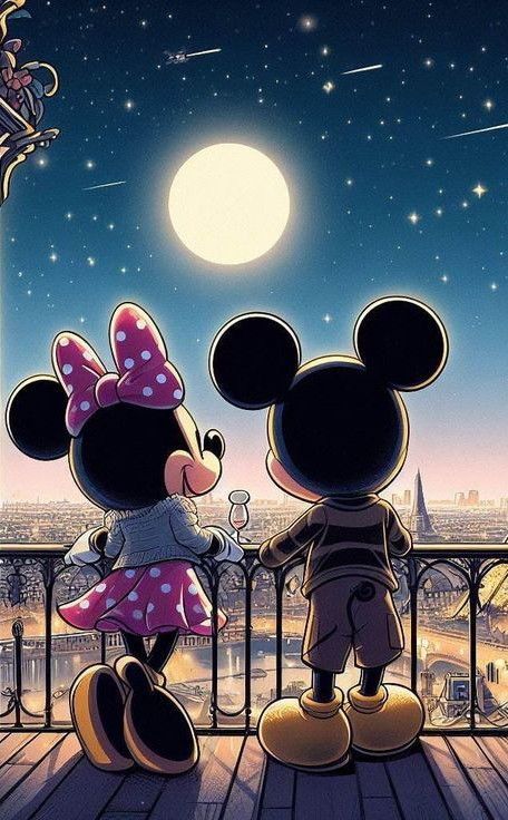 two mickey and minnie mouses are standing on a balcony looking at the night sky