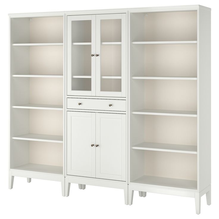 a white bookcase with glass doors and drawers