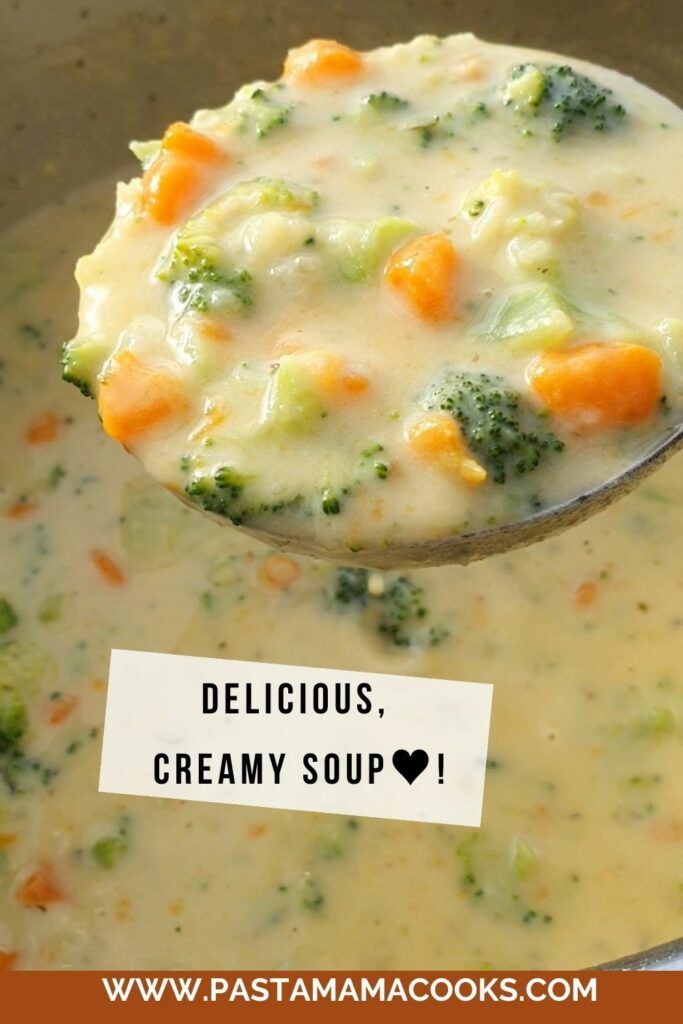 a spoon full of creamy soup with broccoli and carrots in it that says delicious, creamy soup