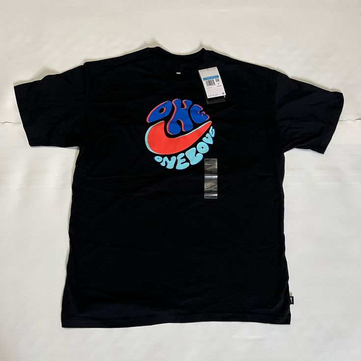 One Love Nike Tee Size Medium Brand New Great Condition Feel Free To Offer And Check Out Other Items In My Closet! Thank You For Viewing, Have A Good Day Nike Retro Short Sleeve Top, Nike Retro Tops With Letter Print, Retro Nike Tops With Graphic Print, Shirts Nike, Nike Tee, One Love, Have A Good Day, Nike Tees, Nike Shirts