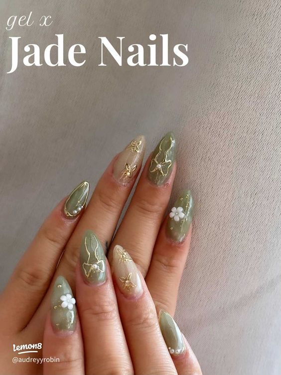 Sage Green Nails Inspiration, Cute Almond Nails Green, Jade Nails Designs Almond, Jade Nails Gel, Moss Green Nails Acrylic, Jade Almond Acrylic Nails, Gold Brown Nails Design, Jade Short Nails, Sage Green Nails With Charms