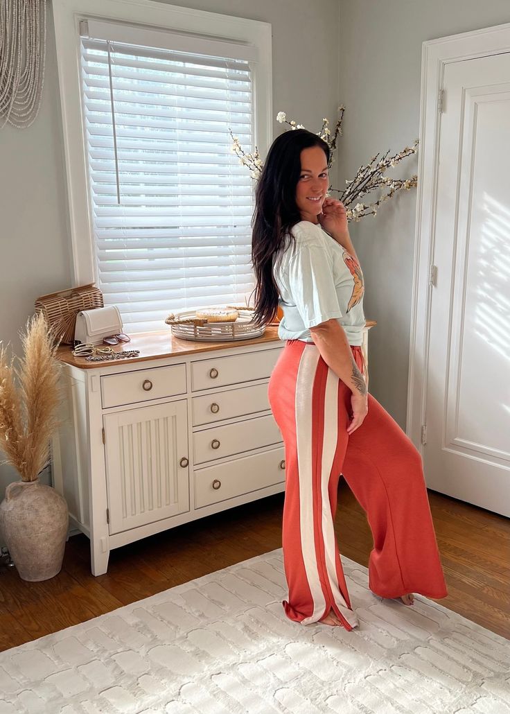 Wide Leg Super soft Drawstring waist High waist Side Stripe Trendy Model is 5'8 and 175 wearing a MEDIUM Fabric: 42% Polyester40% Cotton18% Rayon *If you are in between sizes, we recommend sizing down SMALL 6-8 MEDIUM 10-12 LARGE 12-14 Secret Sale, Beach Wears, Side Stripe, Jacket Tops, Outerwear Jackets, Drawstring Waist, Jumpsuit Dress, Jumpsuit Romper, Rust