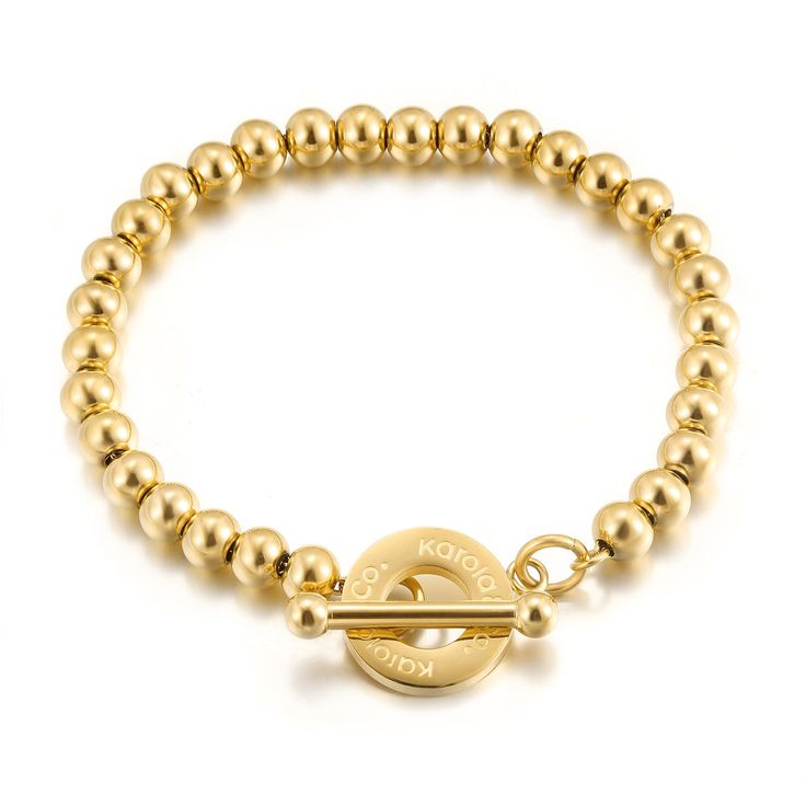 7.5” stainless steel gold beads bracelet with our signature clasp. - - - Pulsera de 7.5” en stainless steel con nuestro cierre signature. Elegant Metal Bracelet With 8mm Beads, Gold Stainless Steel Chain Bracelet Nickel Free, Everyday Metal Bracelets With Gold Clasp, Gold Stainless Steel Bracelet, Nickel Free Gold Beaded Bracelets For Everyday, Metal Bracelets With Round Beads For Everyday, Everyday Metal Bracelets With Round Beads, Gold Bracelet With 8mm Beads For Everyday, Elegant Stainless Steel Beaded Bracelets For Everyday