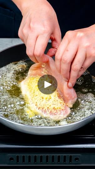 someone is frying some food in a pan on the stove