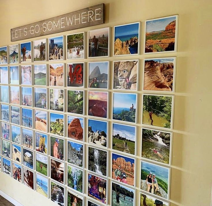 there is a wall with pictures on it and the words let's go somewhere