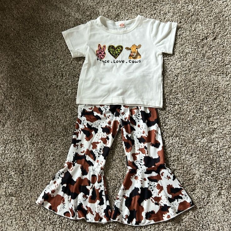 Cute Toddler Cow Outfit With Cow Print Flare Pants And Matching Top. Size 2t. Never Worn. Cute White Pants For Playwear, Playful White Pants For Playtime, Casual White Pants For Playwear, Playful White Bottoms For Fall, Flare Outfit, Print Flare Pants, Cow Outfits, Printed Flare Pants, Matching Top